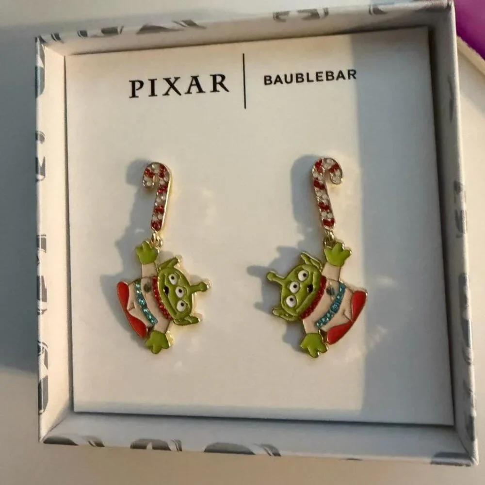 Pixar x BaubleBar Alien Candy Cane Earrings,